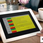 Reviewing PMO RAG level guidance on tablet