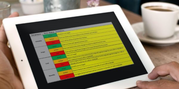 Reviewing PMO RAG level guidance on tablet