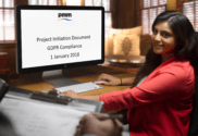 Business lady writing a project initiation document